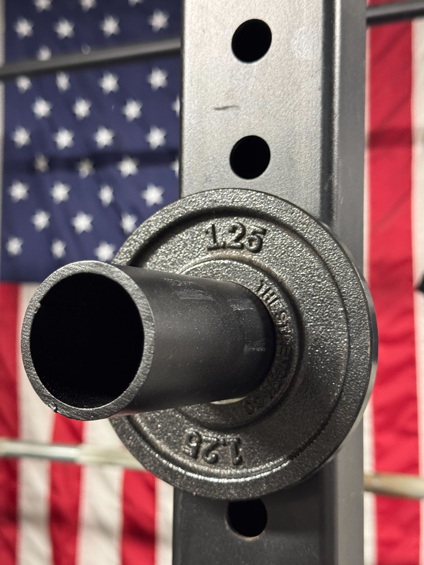 Magnetic Olympic Barbell Change and Micro Plate Storage Peg