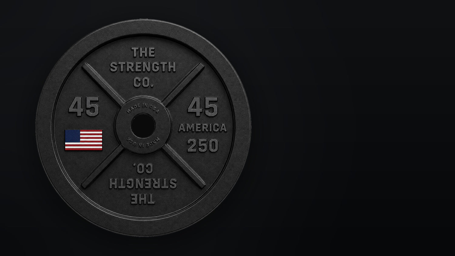 The Strength Co. America 250 black cast iron 45 lb plate with a colorized American flag on a black background