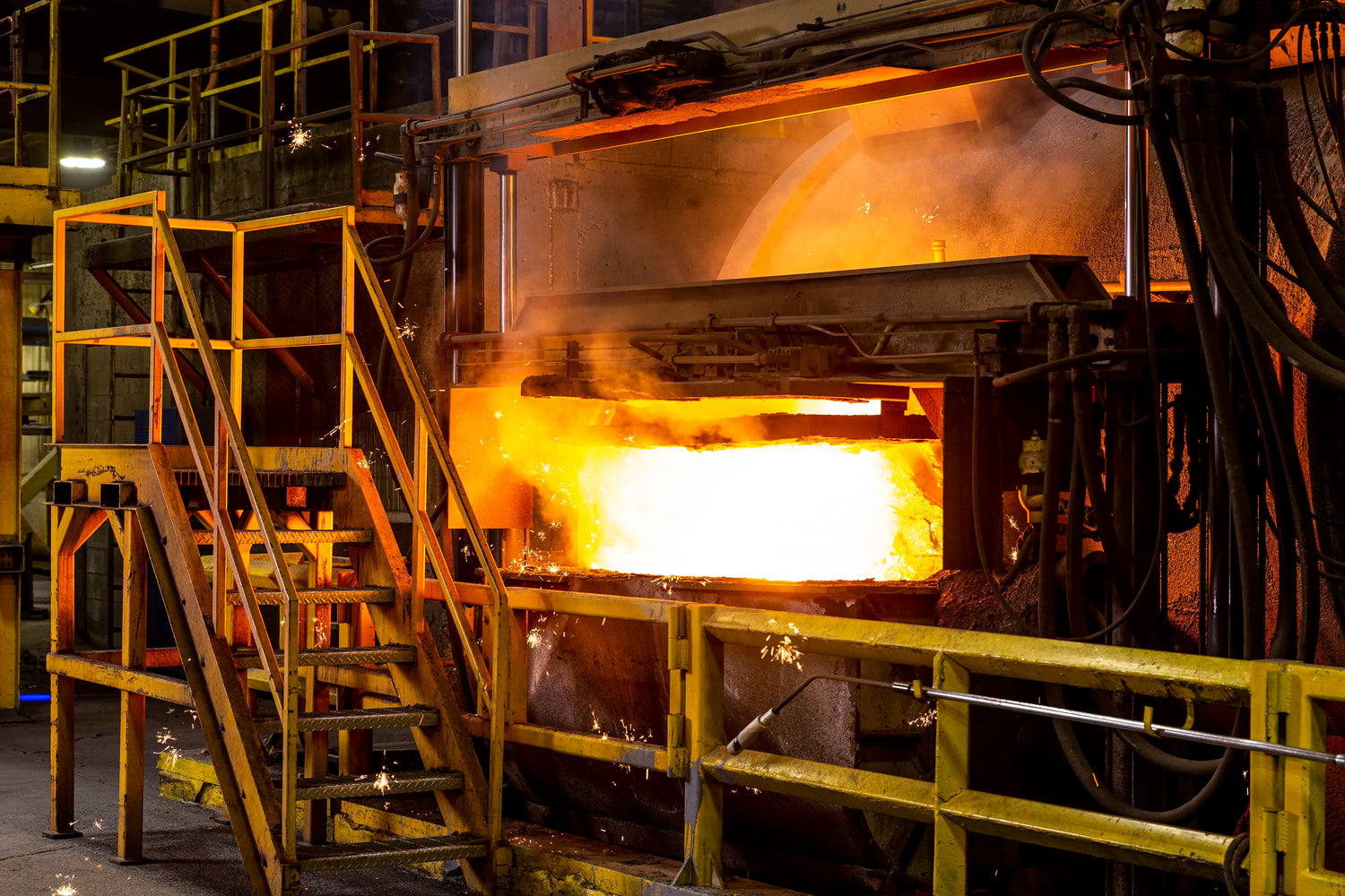 Molten iron pouring at the American foundry that casts The Strength Co. plates