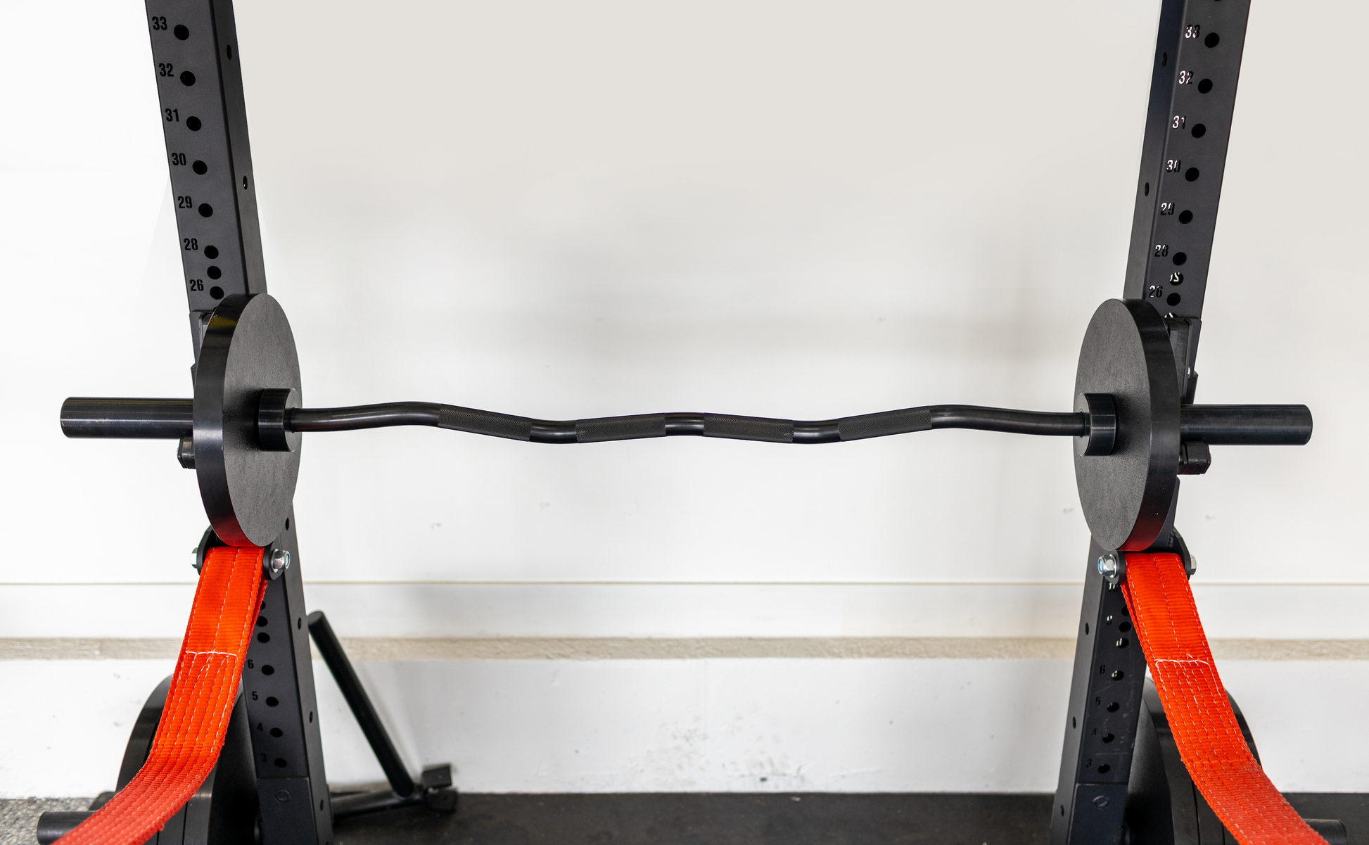 curl bar in squat rack