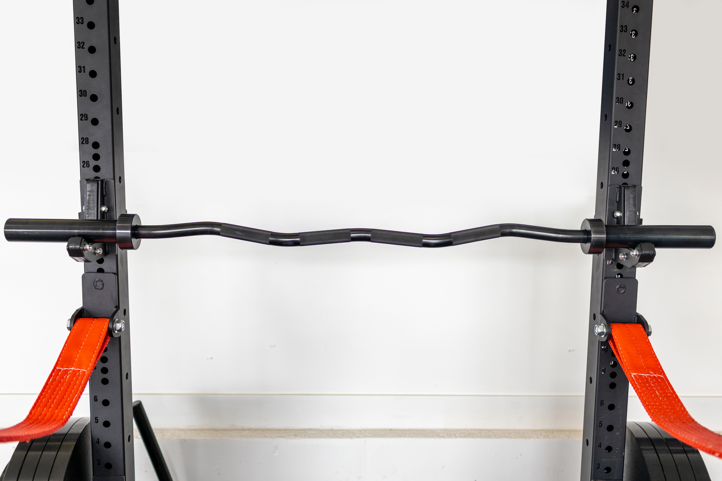 curl bar in squat rack