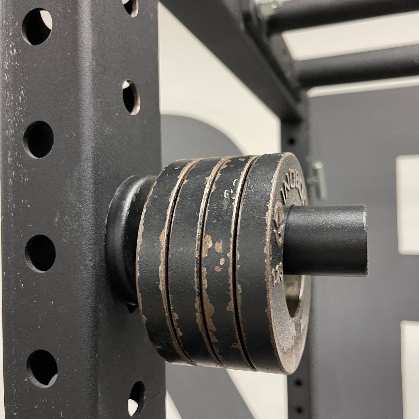Magnetic Olympic Barbell Change and Micro Plate Storage Peg